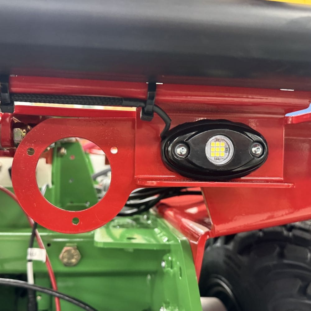 BRACKET, CHARGING PLUG PORT